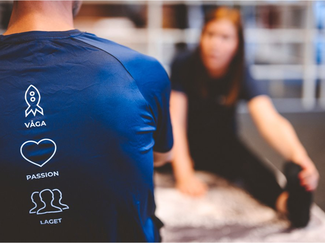 Two people stretching